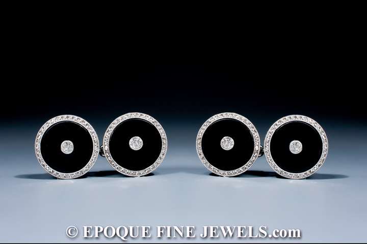A pair of Art Deco onyx and diamond cufflinks